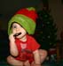 Isabella - Santa's Little Helper on Christmas Eve eating Daddy Lens Cap